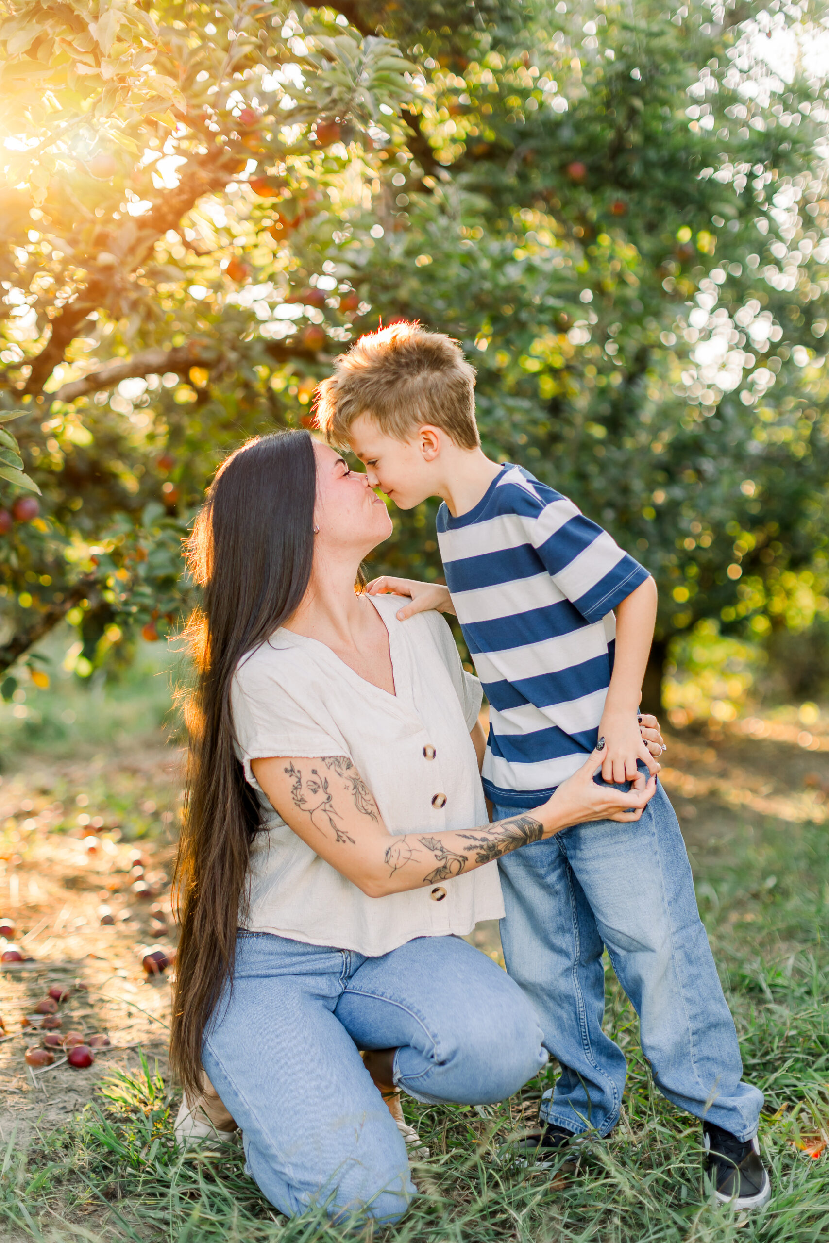 mother and son at a fall family photo shoot at an apple orchard in cleveland tennessee with chattanooga family photographer alyssa rachelle photography